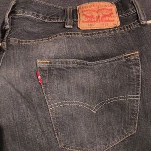 Levi’s 501 jeans dark grey.